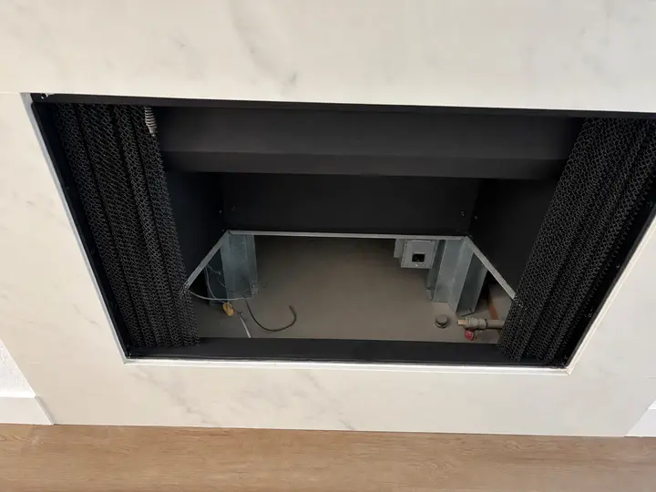 Clean fireplace opening after debris removal