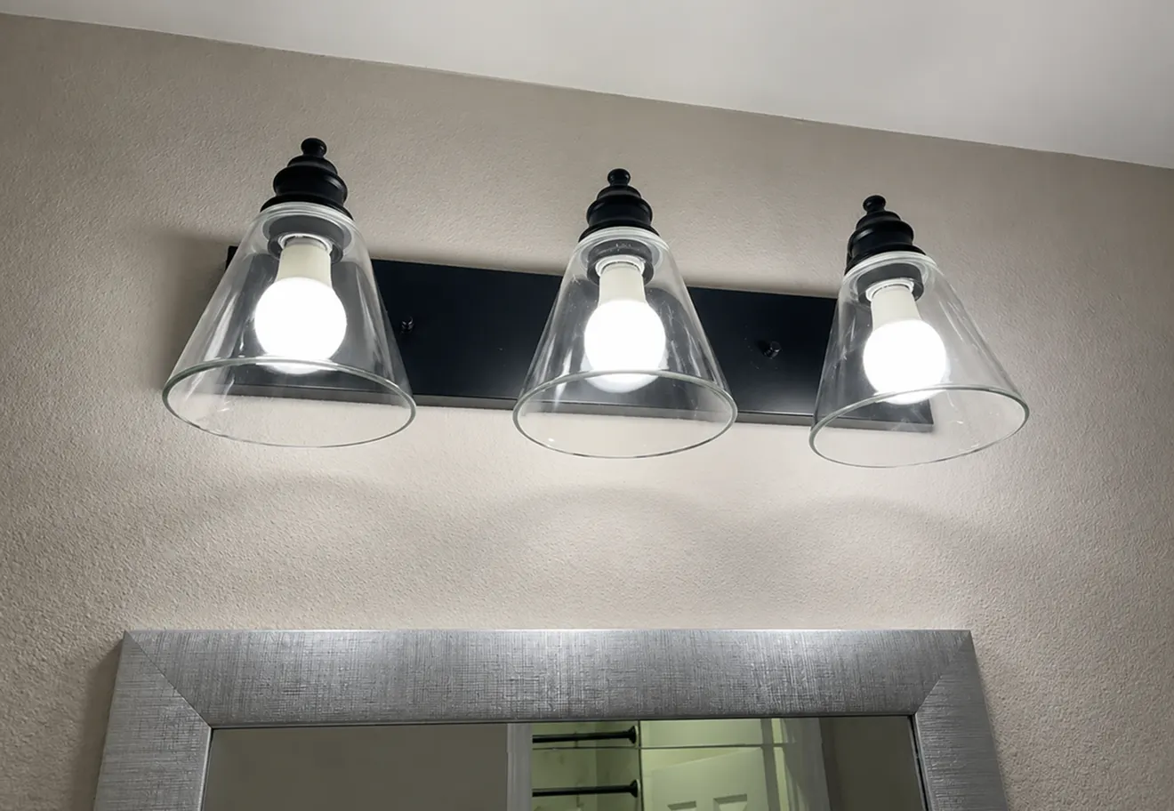 Clean bathroom vanity lights after cleaning