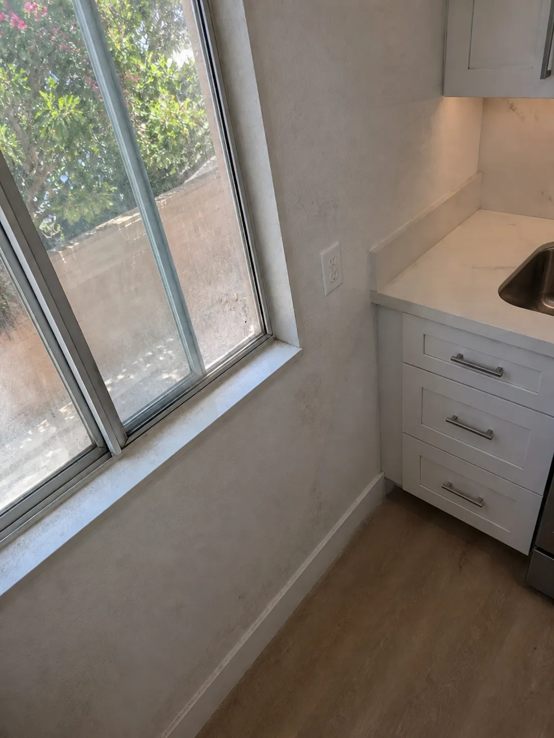 Dirty window corner and sill before detail cleaning