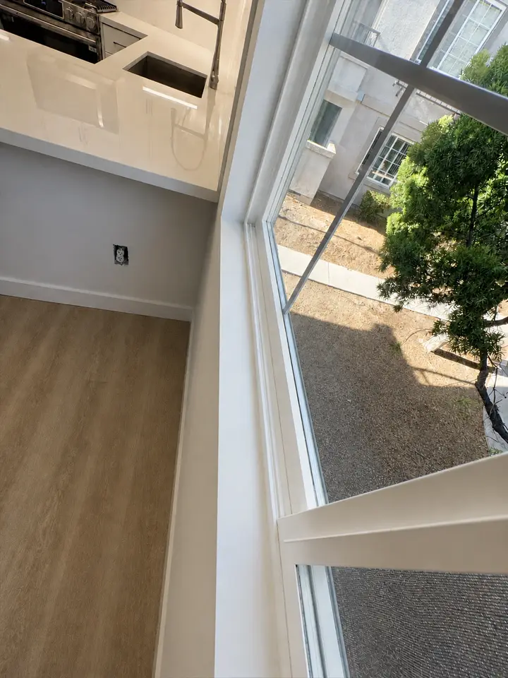 Clean kitchen window wall after detail cleaning